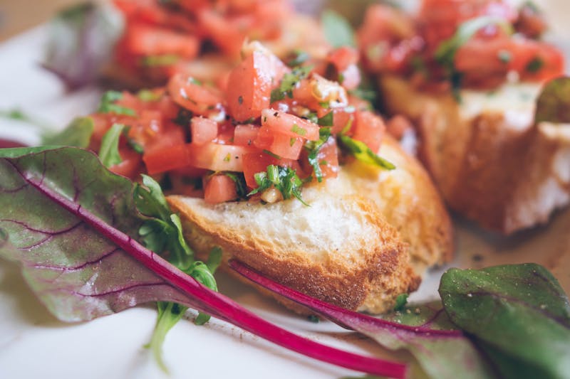 Crispy bruschetta topped with fresh tomatoes and basil